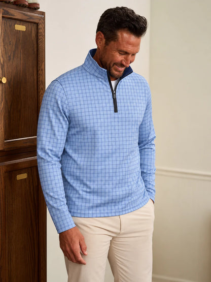 Golfpullover in Kornblumenblau mit Tattersall-Karomuster und Viertelreißverschluss