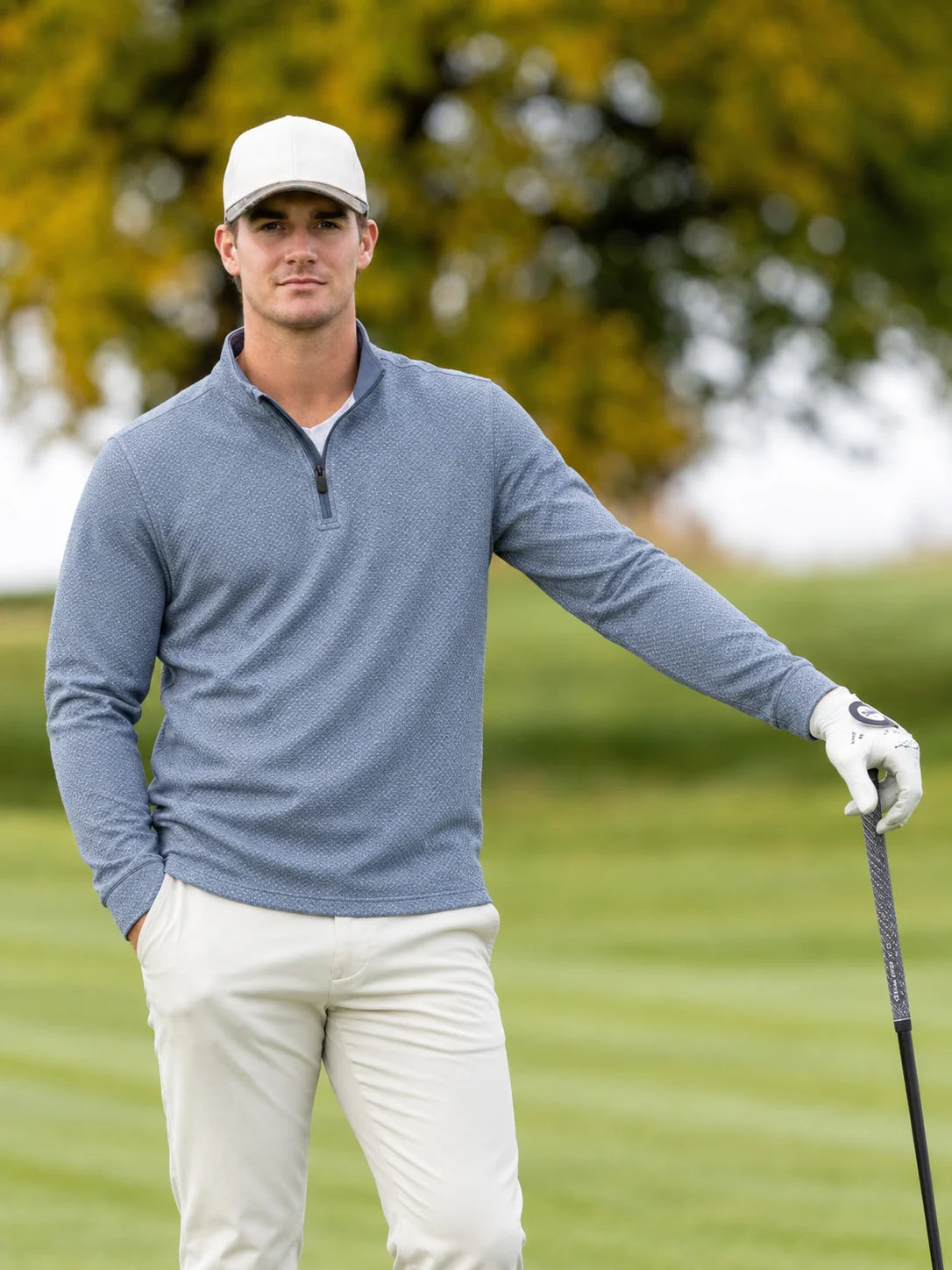 Blauer Golf-Pullover mit kurzem Reißverschluss und Mikro-Punktmuster