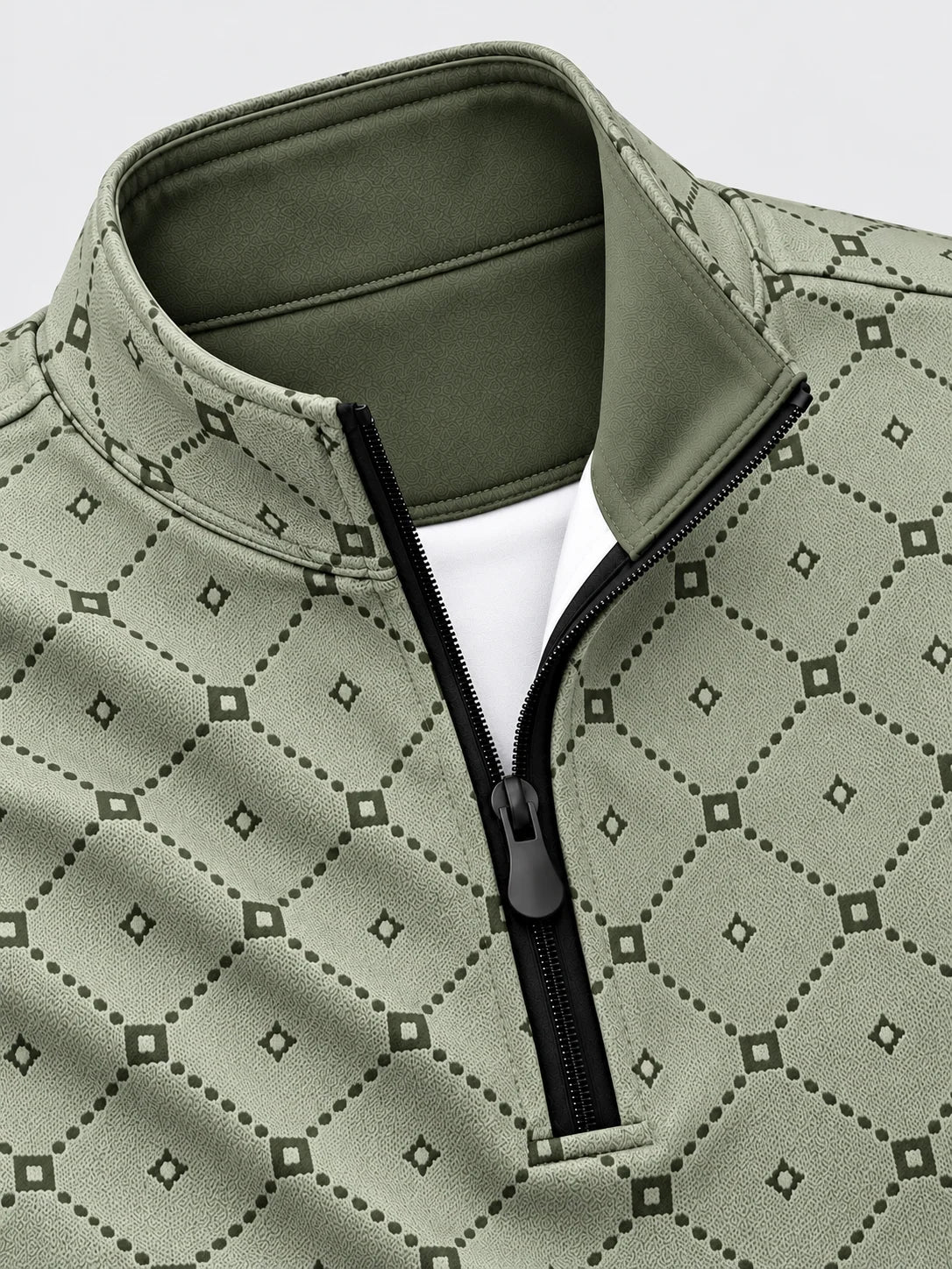 Salbeigrüner Golfpullover aus Funktionsmaterial mit geometrischem Muster und kurzem Reißverschluss