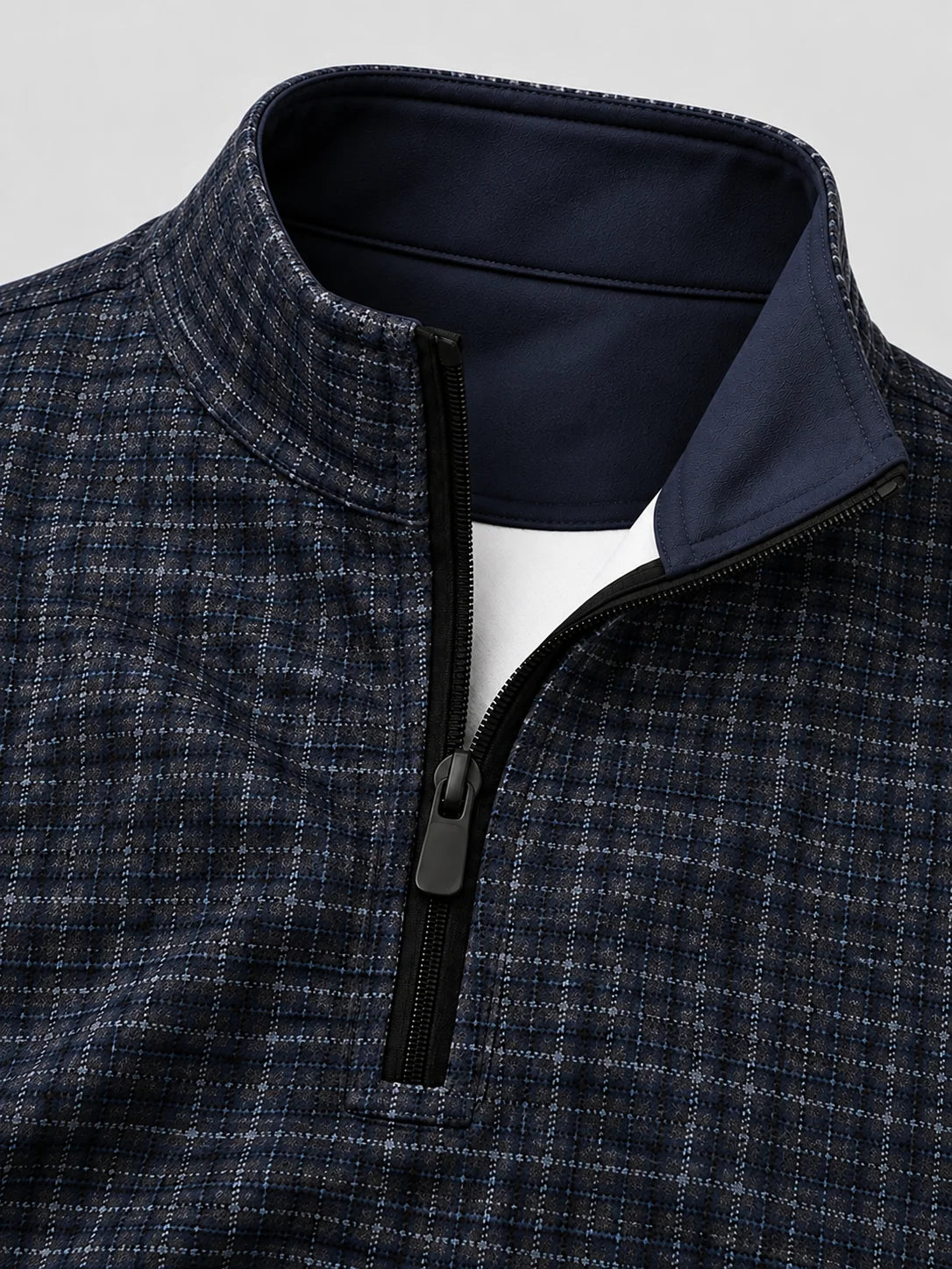 Marineblauer Karo-Performance-Golfpullover mit kurzem Reißverschluss
