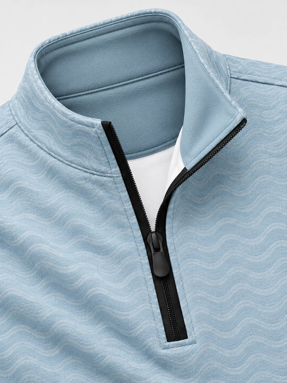 Golfpullover mit Wellenstruktur in Eisblau, Funktionsmaterial und Viertelreißverschluss